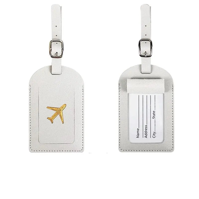 étiquette bagage avion doré voyage